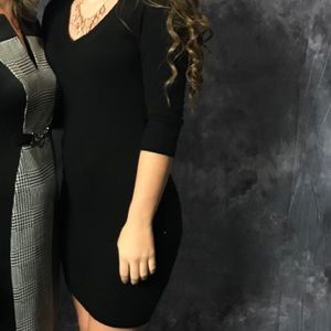 Simple black v-neck sweater dress